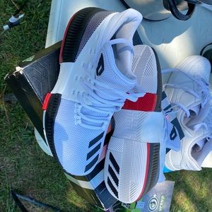 Adidas they are size 5 1/2 black white and red never been worn